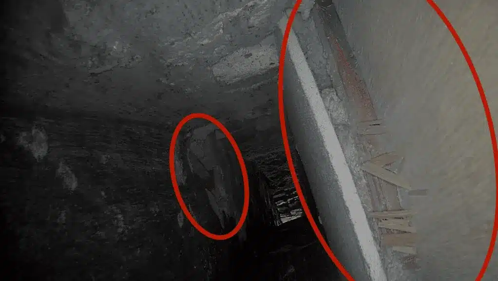 Boarded Chimney Damage Found During Party Wall Inspection Internal chimney damage and boarding discovered during a chimney inspection linked to party wall work
